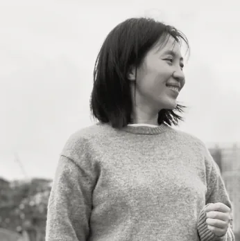 Black-and-white portrait of Rita Chou